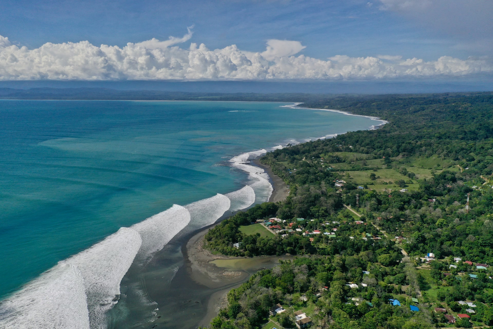 Aerial view of Pavones rivermouth and coastline